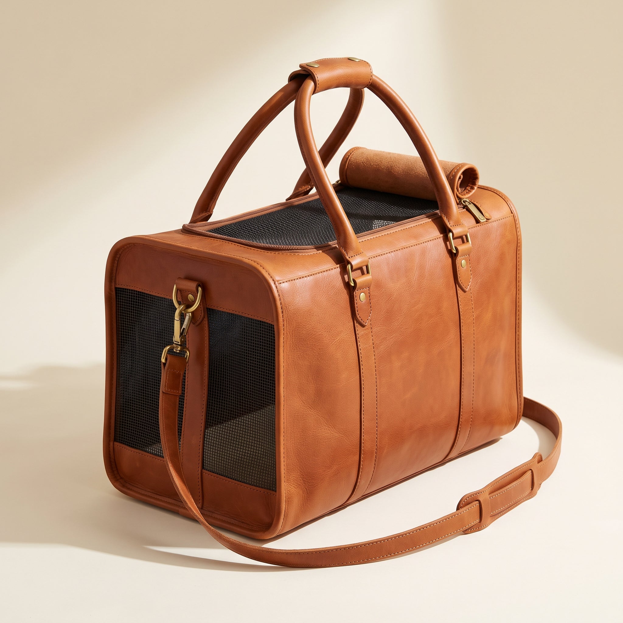 Tan leather convertible pet carrier, tote backpack and shoulder strap configurations, mesh ventilation