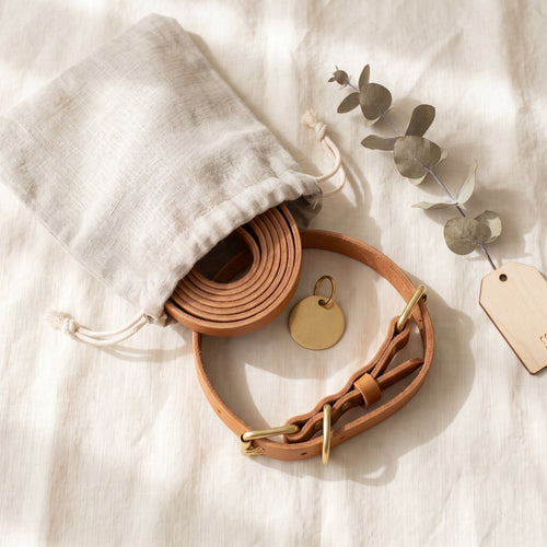 Poke gift set starter: tan collar and matching leash and brass tag in linen pouch, gift-ready packaging