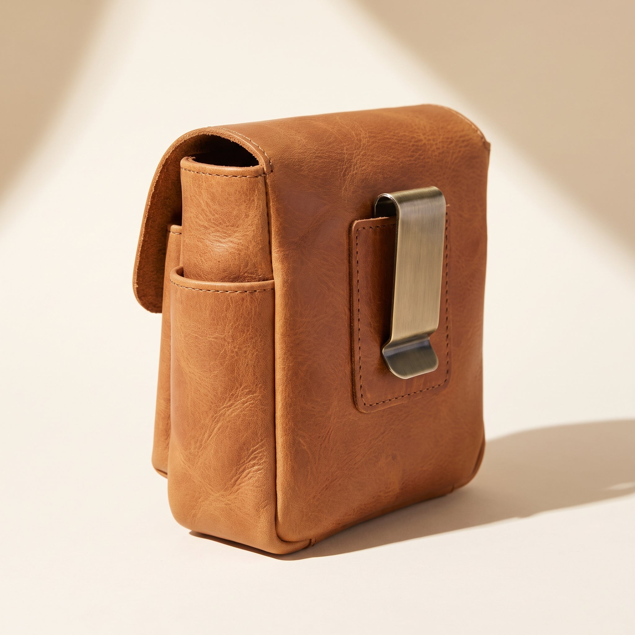 Tan leather dog treat training pouch with magnetic closure, belt clip and side pocket