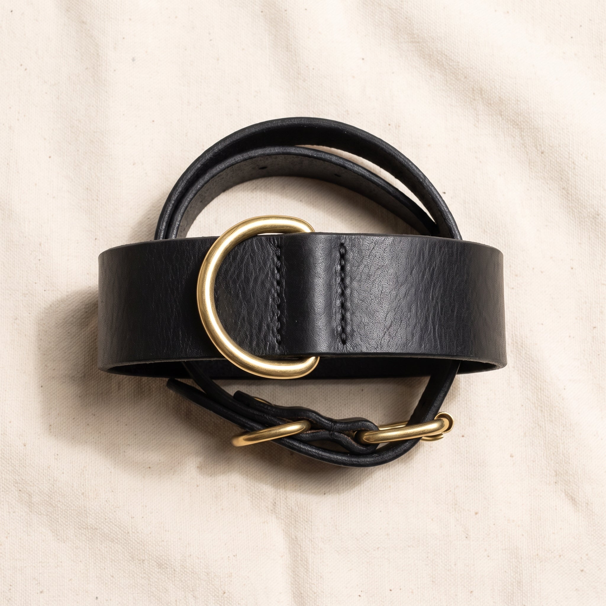Wide hand-tanned onyx black leather dog collar, brass D-ring and replaceable buckle